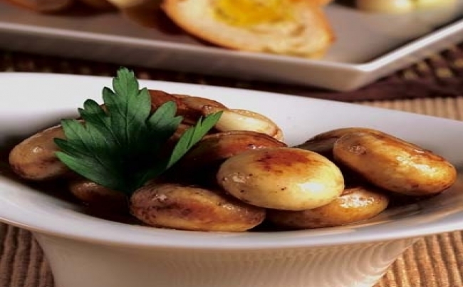 Champiñones flambeados al pisco